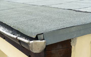 repair or replace Reedley flat roofing?